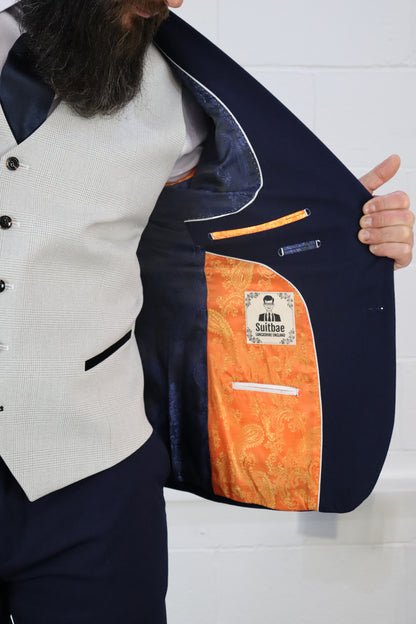 Close-up of the SUITBAE Charles Navy with Contrast Stone Waistcoat Three Piece Suit — showing the signature SUITBAE Tangerine paisley inner lining, navy blazer interior pockets, and quality tailoring details — perfect for weddings, proms, and formal occasions — available at SUITBAE Blackpool, Barnsley and shpxlxnx.top.