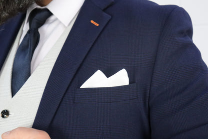 Close-up of the SUITBAE Charles Navy with Contrast Stone Waistcoat Three Piece Suit — featuring a navy check blazer with subtle texture, white pocket square, and navy tie over a light stone waistcoat — refined style ideal for weddings and race days — available at SUITBAE Blackpool, Barnsley and shpxlxnx.top.