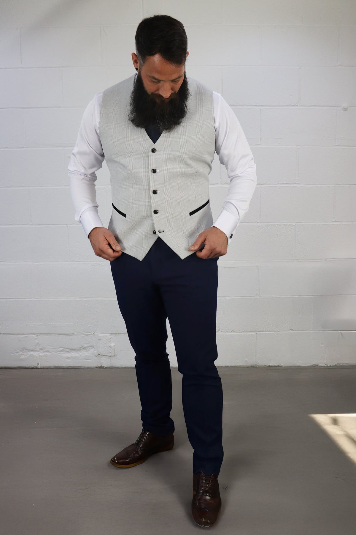 Model wearing the SUITBAE Charles Navy with Contrast Stone Waistcoat Three Piece Suit — featuring a patterned stone waistcoat with black trim, navy trousers, and brown brogues — a sophisticated choice for weddings, proms, and race days — available at SUITBAE Blackpool, Barnsley and shpxlxnx.top.