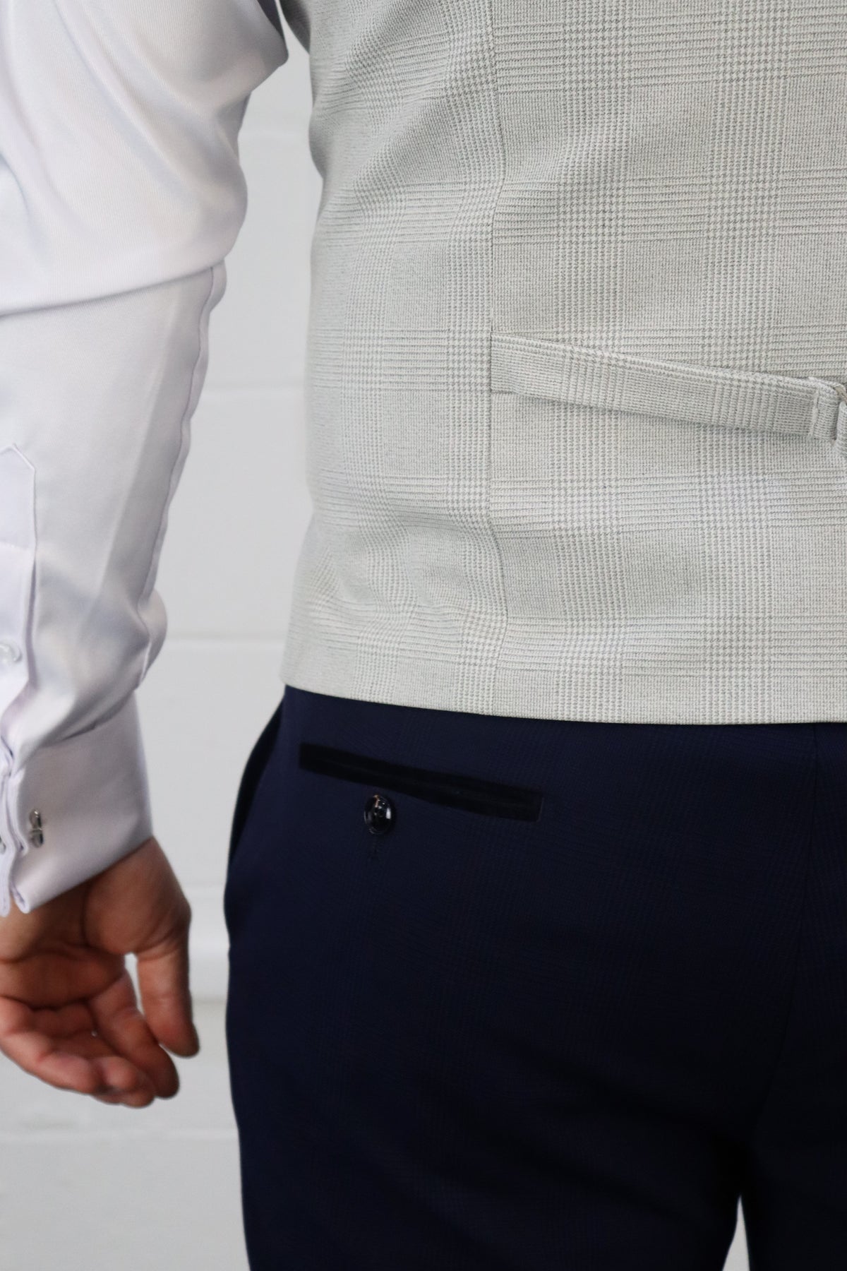Close-up of the SUITBAE Charles Navy with Contrast Stone Waistcoat Three Piece Suit showing the light stone waistcoat pattern and navy trousers with contrast black trim — perfect wedding and race day tailoring — available at SUITBAE Blackpool, Barnsley and shpxlxnx.top.